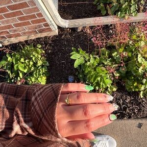 14k Gold Peridot Ring with Small Diamonds